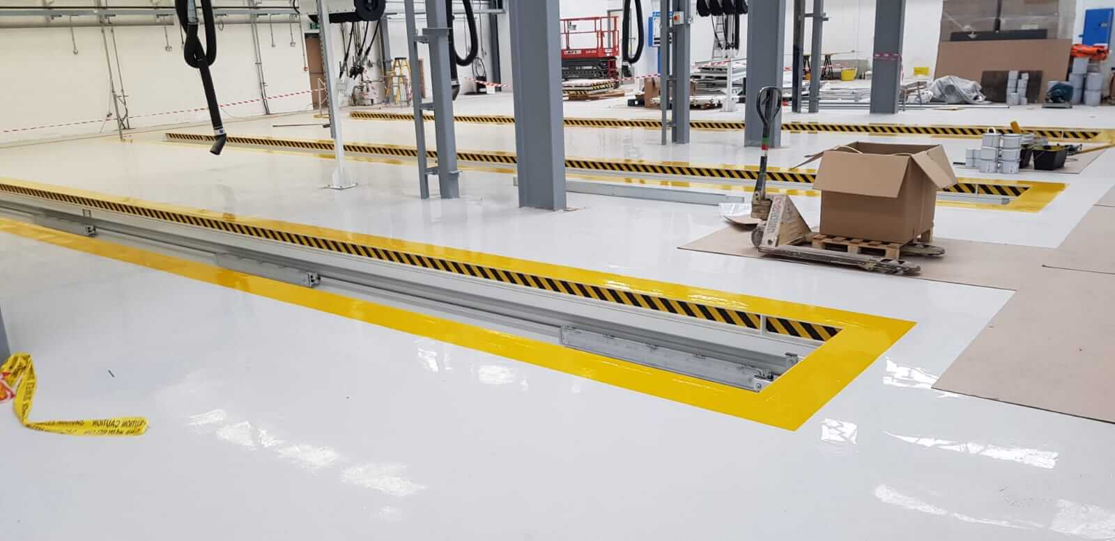 Floor markings and oil resistant coatings